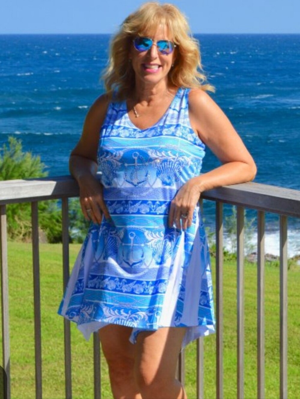 Summer dress by India boutique one size I think it fits a 12-14  or 16 best